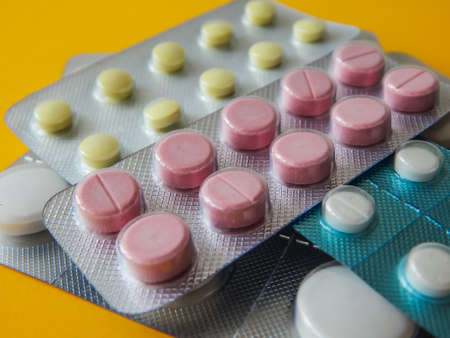 tablets in packs of different shapes and colors