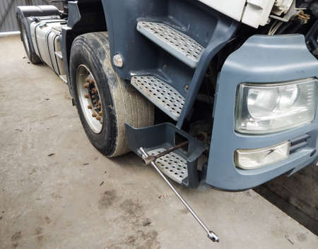 lift truck cab, wheel removal tool and brake pad replacementの写真素材