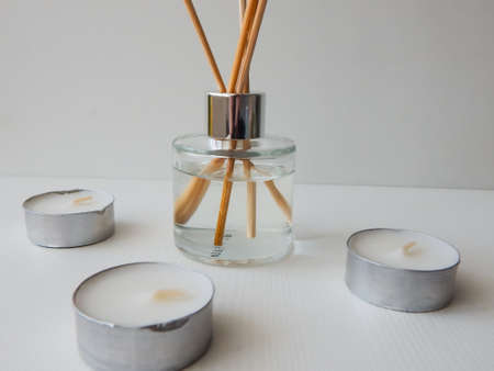 aroma with wooden sticks and candlesの写真素材