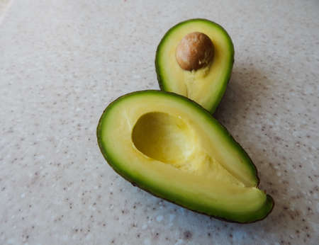 exotic avocado fruit, lying on a light background