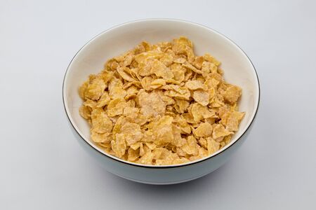 Frosted corn flakes cereal in a bowl
