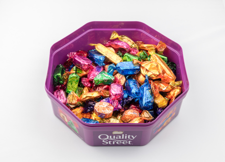 CHESTER, UK - JANUARY 28TH 2017: A close-up of the Nestle Quality Street tub with lid offのeditorial素材