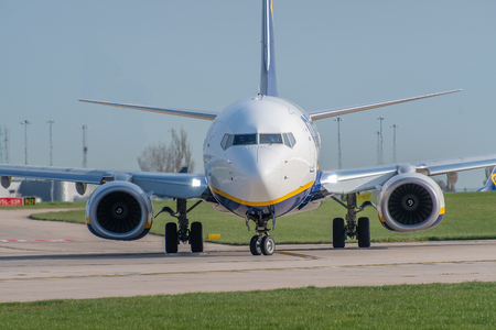 MANCHESTER, UNITED KINGDOM - APRIL 21st, 2018: Ryanair Boeing 737 taxiing to runway at Manchester Airportのeditorial素材