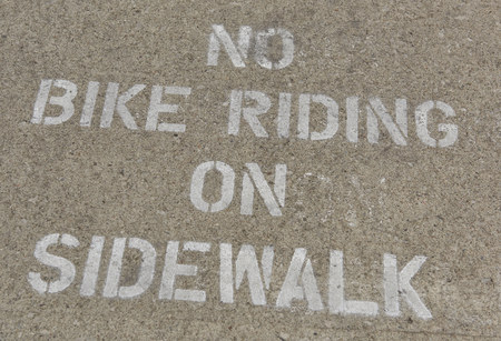 sidewalk warning of no bike ridingの写真素材