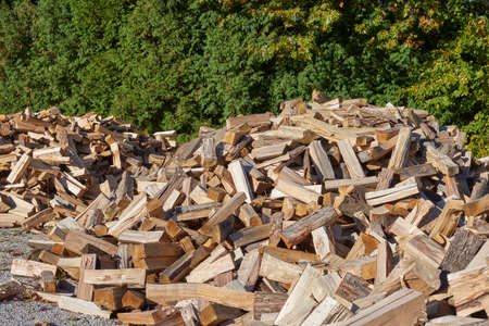 Piles of cordwood at landscape nursery ready for customer sales
