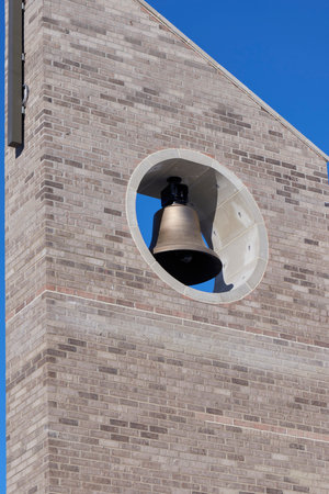 Catholic Church bell tower and crossの写真素材
