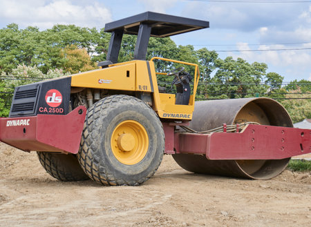 heavy construction equipment at idle building site.