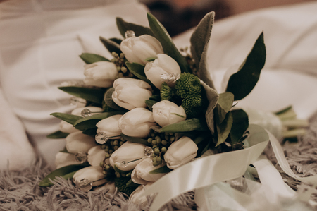 White wedding flowers near the bride in the morning. Holiday bouquetの写真素材