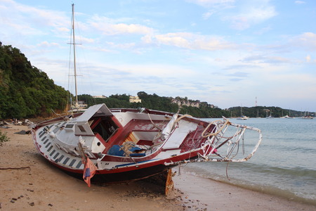 sailingboat after a storm on  Ao Yon Beach, Phuket Island, Thailand