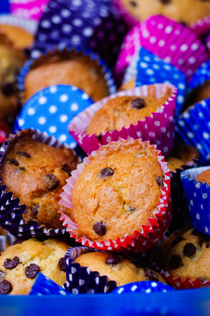 colorful nicely decorated homemade muffins and cakesの写真素材