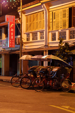 Georgetown, Penang, Malaysia - April 18, 2015: Classic local rickshaw in George Town, Penang in...