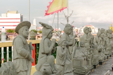 GEORGETOWN, MALAYSIA - MAY 29: closeup view of Hean Boo Thean Kuanyin Chinese Buddhist temple in Clan Jetties with a raw of statues. Built on stilts over the harbor of George Townのeditorial素材