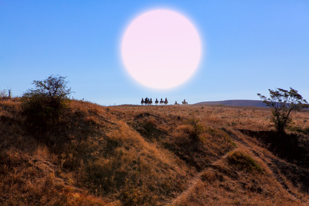 riders at moon risingの写真素材