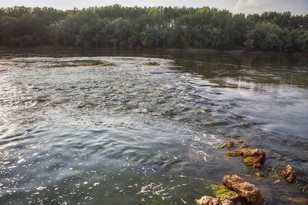 flowing river waterの写真素材