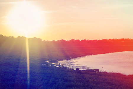 natural landscape with sunrise and lakeの写真素材