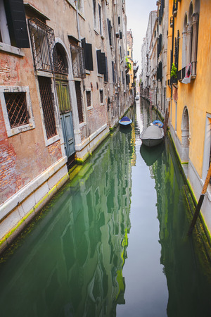 typical gondola canal , narrow street in Veniceの写真素材