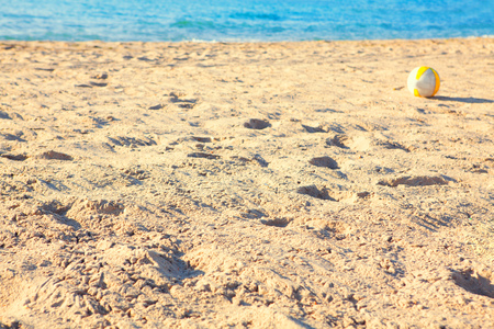 volleyball ball on suuny beachの写真素材
