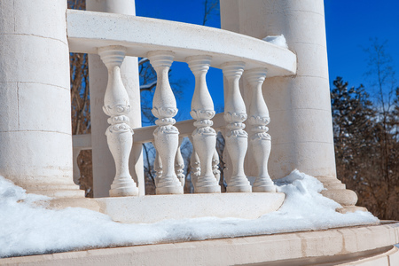 white balustrade and snow