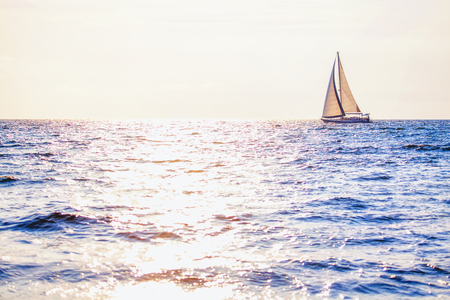 sailing yacht on the horizon