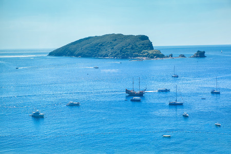 yachts sailing near Island of St. Nicholas in Montenegroの写真素材