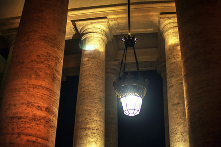 columns in the night and big street lampの写真素材
