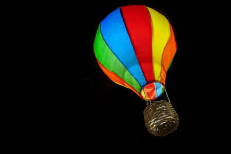 colorful hot air balloon on dark backgroundの写真素材