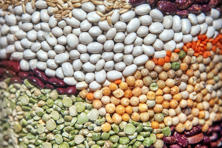 background of different bean seedsの写真素材