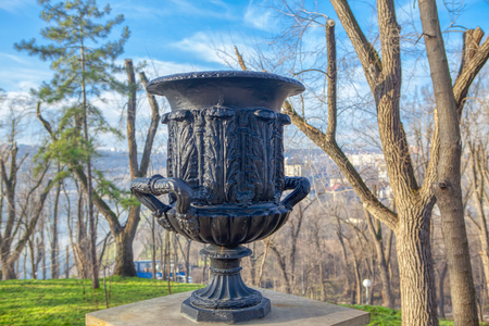 big black flower pot in the parkの写真素材