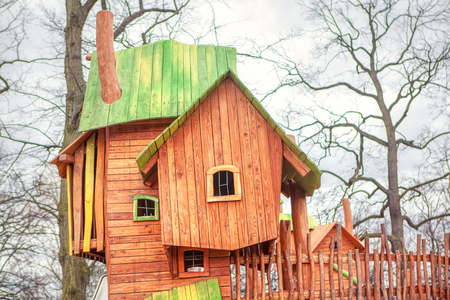 wooden house for children in urban parkの写真素材