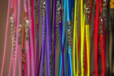 colorful thread bracelets on the showcaseの写真素材