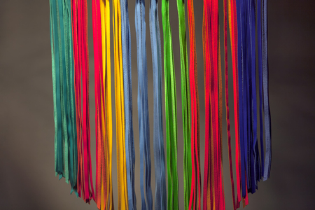 hanging ribbons of different colorsの写真素材