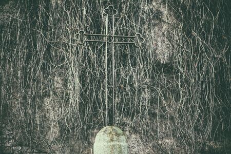 old cross made by steel