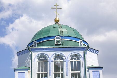 green dome with cross on the topの写真素材