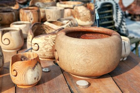 wooden handmade bowls on the tableの写真素材
