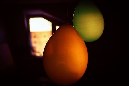 balloons in the dark room , sad birthday