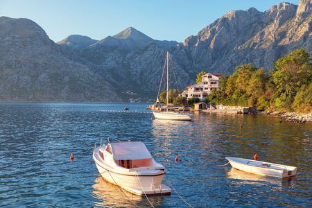 boats and luxury yacht on the bay