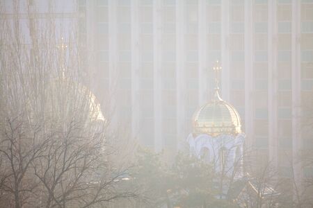 orthodox church dome in the foggy dayの写真素材