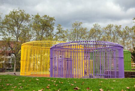 colorful decorative cages in the urban parkの写真素材