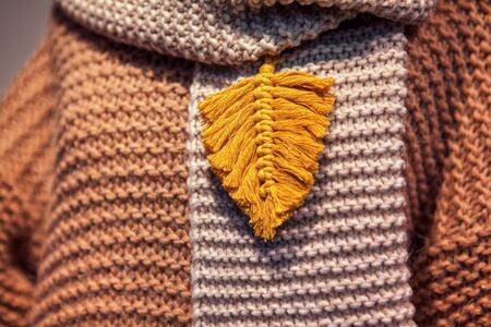 sweater with autumn leaf embroidery
