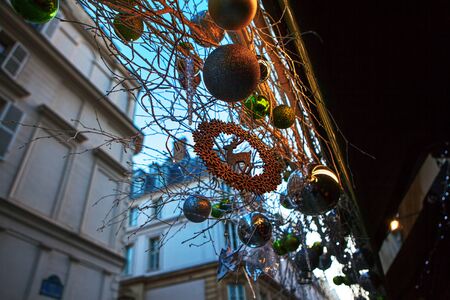 street decoration with hanging Christmas figures