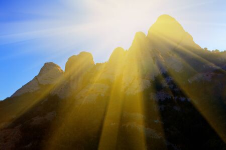 rays of sun over the mountain