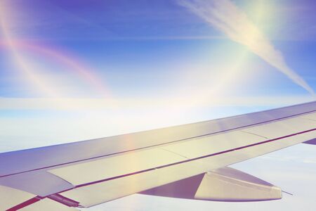 wing view from airplane during the flightの写真素材