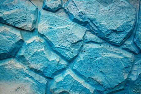 blue wall made by decorative stone