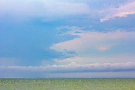 cumulus clouds over the sea