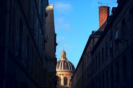 Parisian narrow street and cupola viewの写真素材