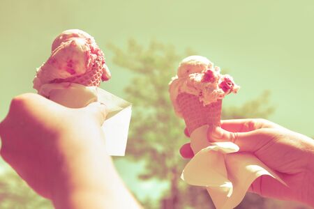delicious ice cream in the handsの写真素材