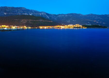 Coastal City At Night ,Scenery with Sea and Mountainsの写真素材