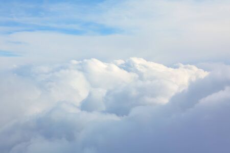 puffy clouds high in the heaven