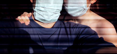 Man and Woman take self photo in Medical Masksの写真素材