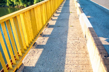 Balustrade and Pedestrian Path . Bridge over the River with walking pathの写真素材